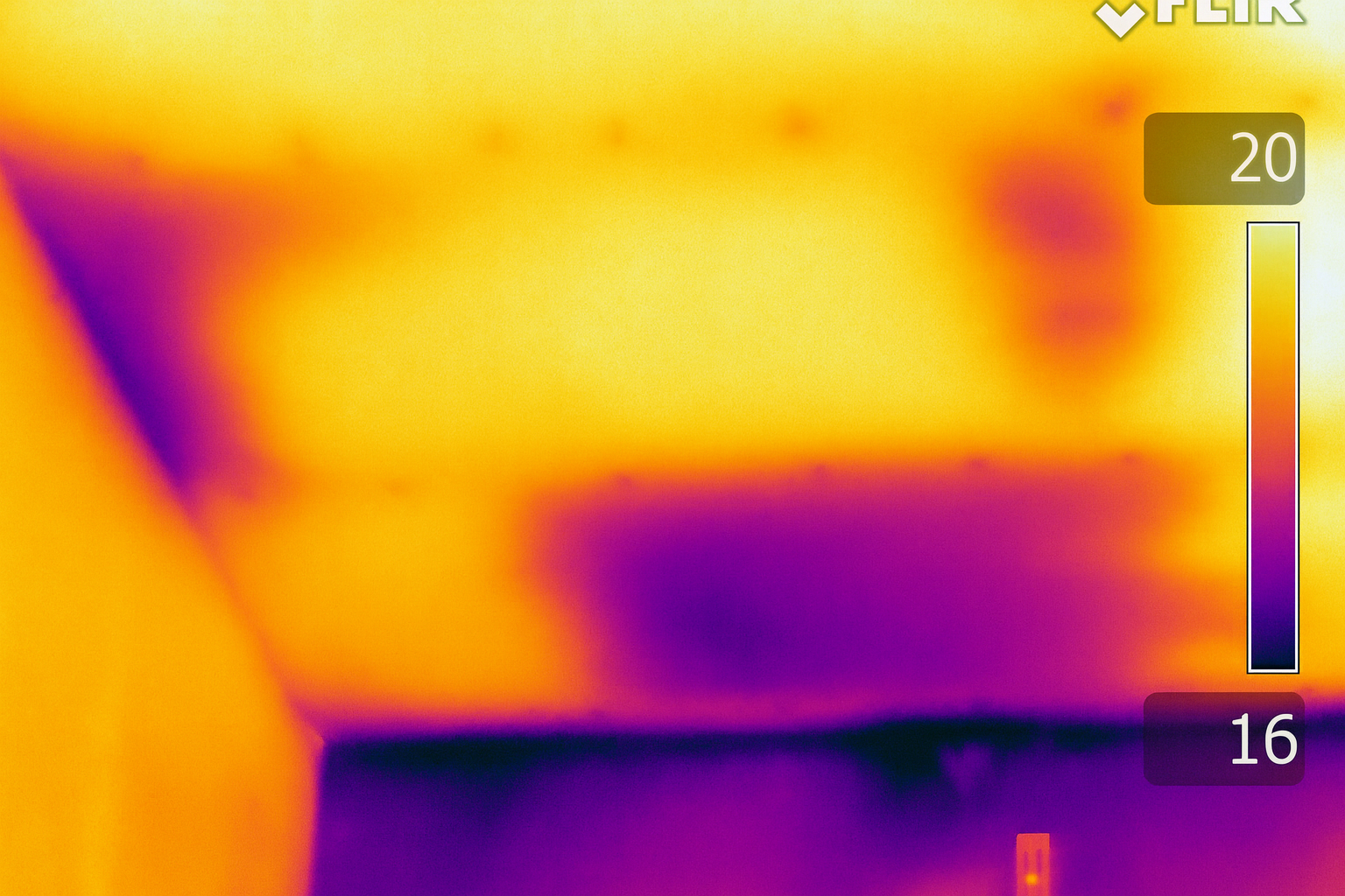 Thermal image showing missing or thin insulation in a ceiling